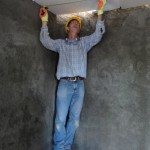 Nick measuring up the plasterboard