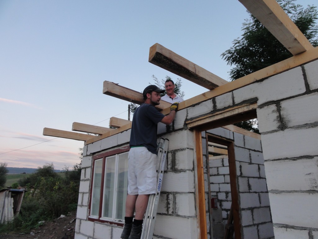 Richard and Sam working on the roof in the second house