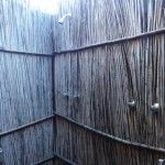 Outdoor showers in our luxury tent