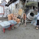 Archie helping out with the cement mixing