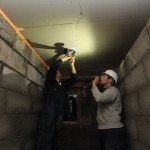 AJ and I screwing the plasterboard into the joists