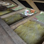 Insulation being installed in the loft